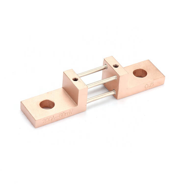 A high-precision DC shunt with copper terminals and metal resistive elements, designed for accurate current measurement in electrical circuits.